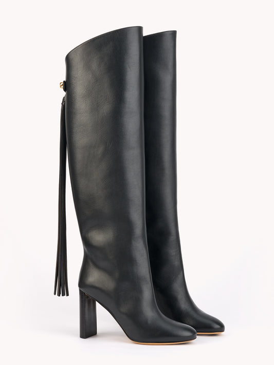 Designer black leather boots with fringes and high heels Maison skorpios by adriana abascal Emanuele filiberto