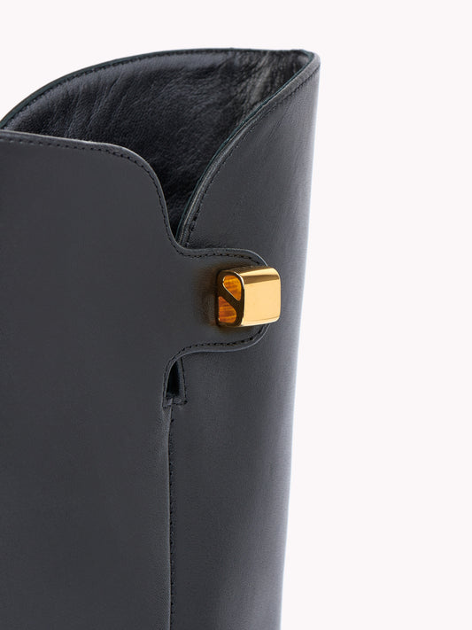 sophisticated black leather ankle boots with mid heels maison skorpios by adriana abascal Emanuele filiberto