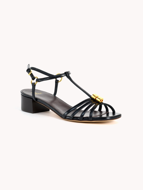 black nappa leather low blow heel sandals maison skorpios by adriana abascal Emanuele di Savoia