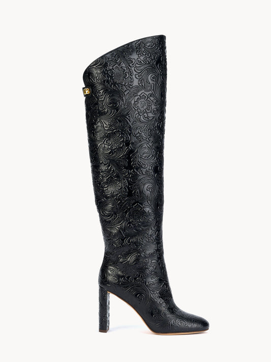 High heel designer trendy boots in black embossed leather with floral patterns by Adriana Abascal Emanuele filiberto