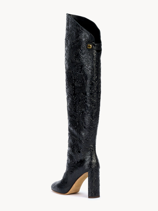Black floral embossed leather boots in luxury materials by adriana abascal Emanuele filiberto