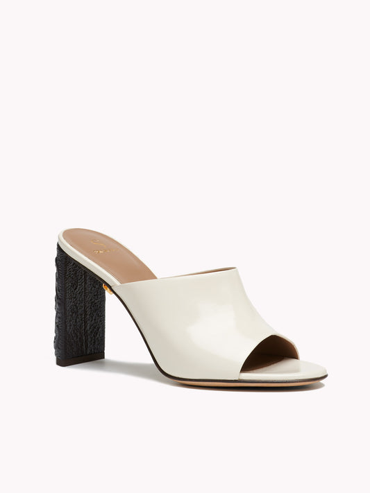 Patent beige leather mules with high heel Maison Skorpios by Adriana Abascal