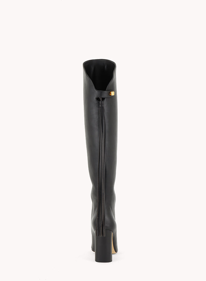Trendy fringes boots in black leather Maison skorpios by adriana abascal Emanuele filiberto