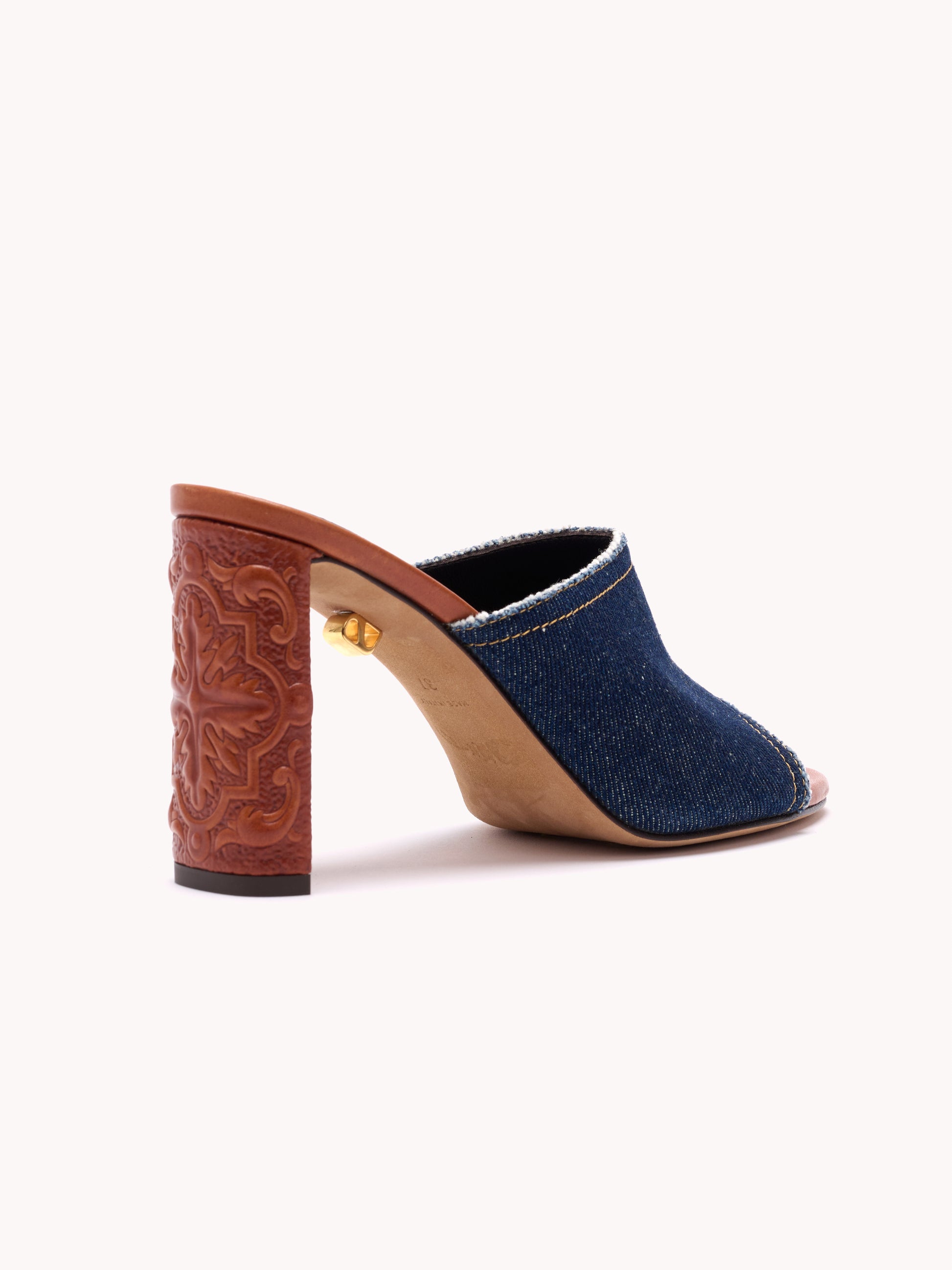 brown embossed leather high-heel mules in blue denim maison skorpios by adriana abascal emanuele filiberto