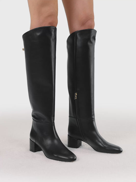 Casual refined style boots with mid heels in black leather by adriana abascal Emanuele di Savoia