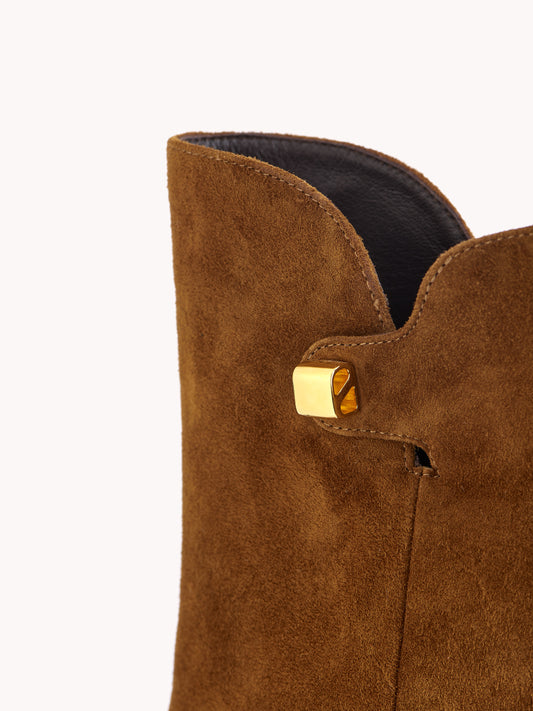 luxury brown ankle boots with mid heels and suede leather maison skorpios by adriana abascal emanuele filiberto di Savoia