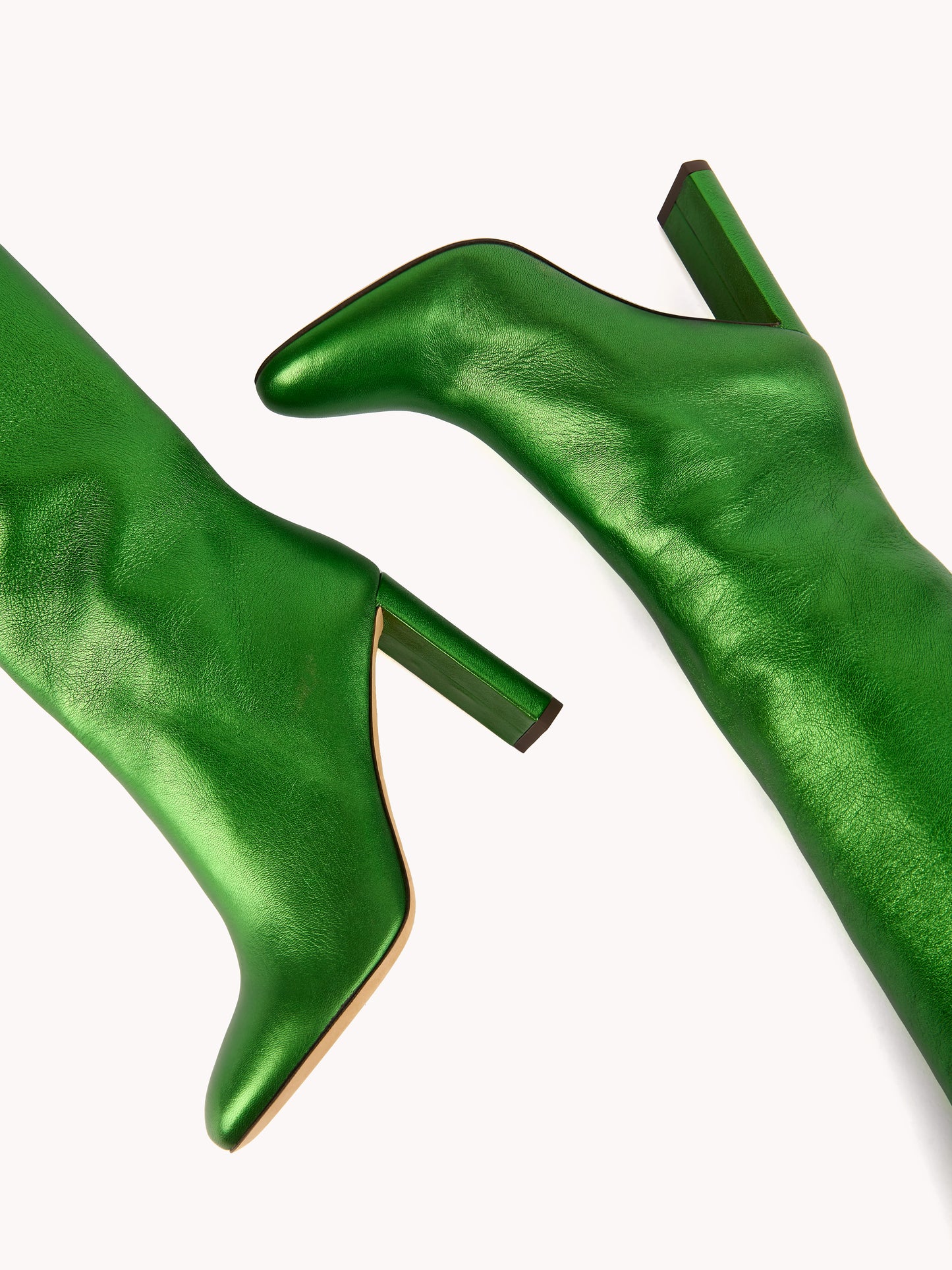 refined metallic green boots with high heel maison skorpios by adriana abascal emanuele filiberto
