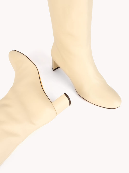 minimalist luxury cream leather mid-heel boots skorpios
