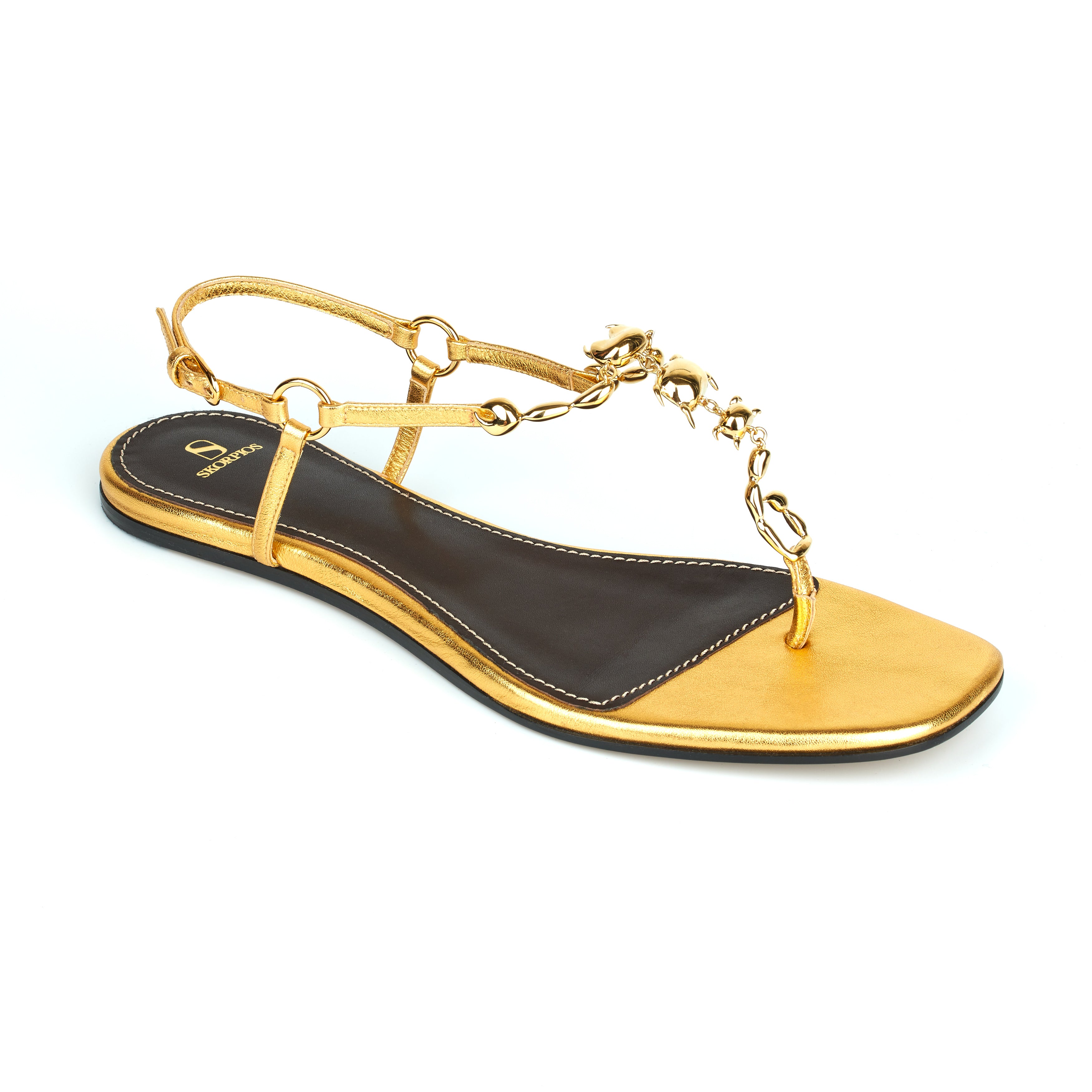 flat metallic gold scorpio sandals maison skorpios by adriana abascal emanuele filiberto di Savoia