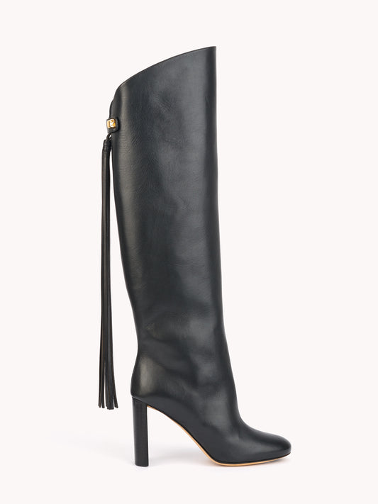 Luxury black leather boots with fringes Maison skorpios by adriana abascal Emanuele filiberto