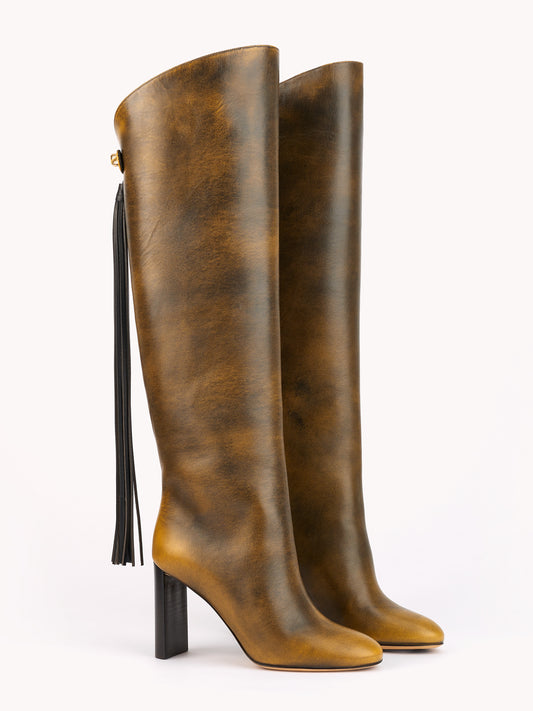 sophisticated luxury equestrian high boots in golden brown leather with removable strap skorpios