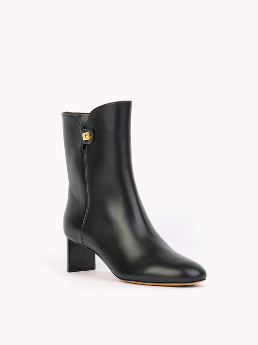 black leather ankle boots comfortable mid-heel skorpios