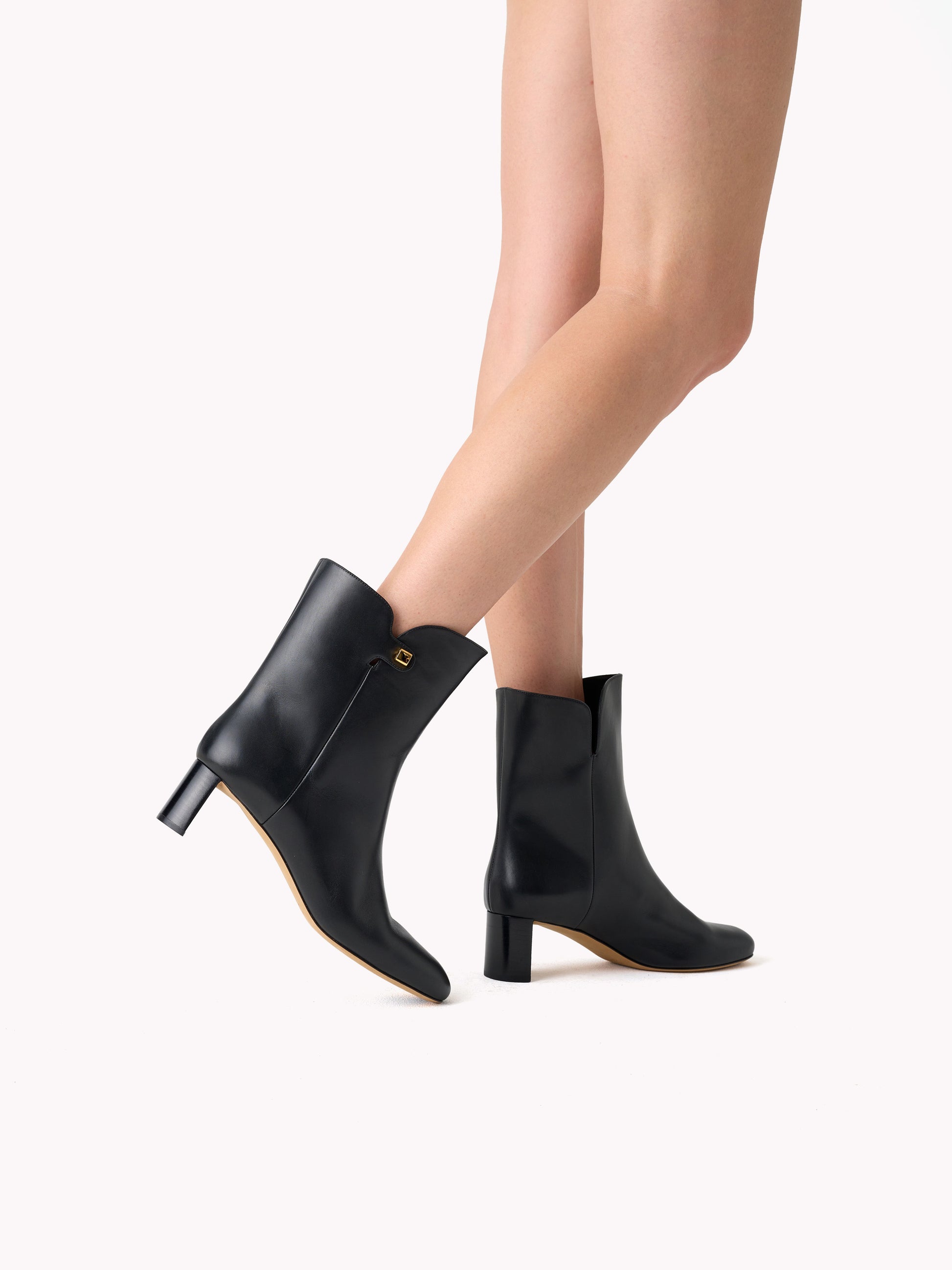 sophisticated black leather ankle boots mid-heel skorpios