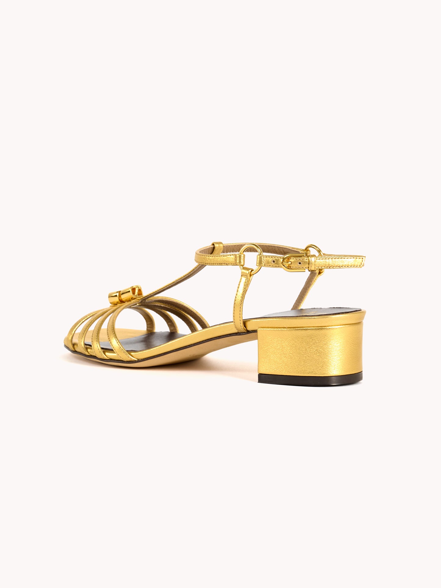gold metallic sandals low block heel skorpios