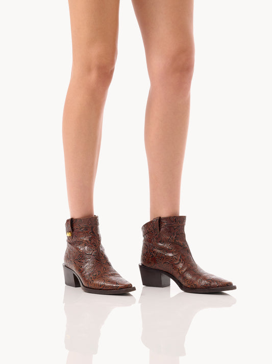West boots in brown floral embossed leather by adriana abascal Emanuele di Savoia 
