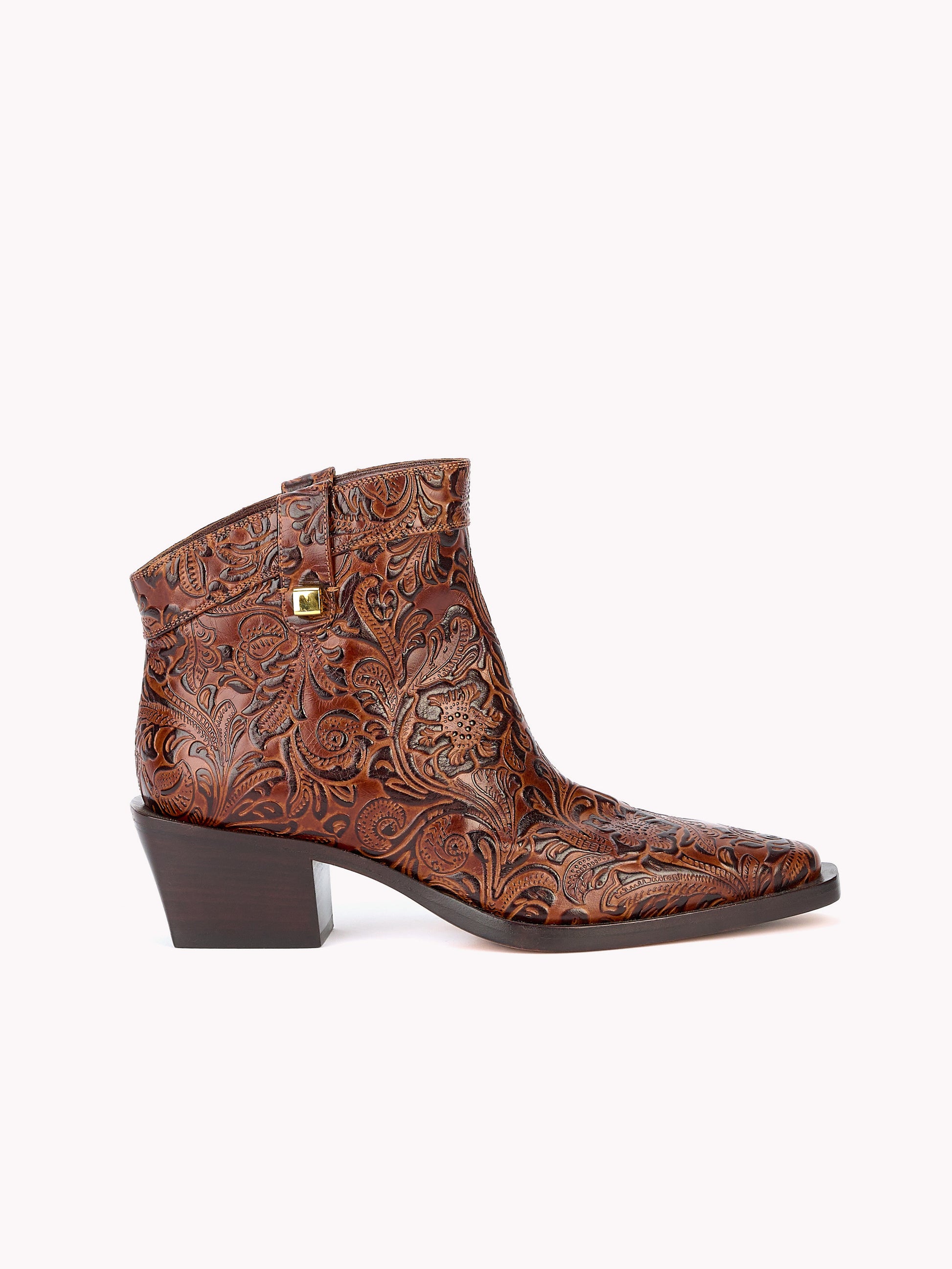 Brown embossed leather santiag boots made in italy by Adriana Abascal Clotilde Courau Emanuele di Savoia 