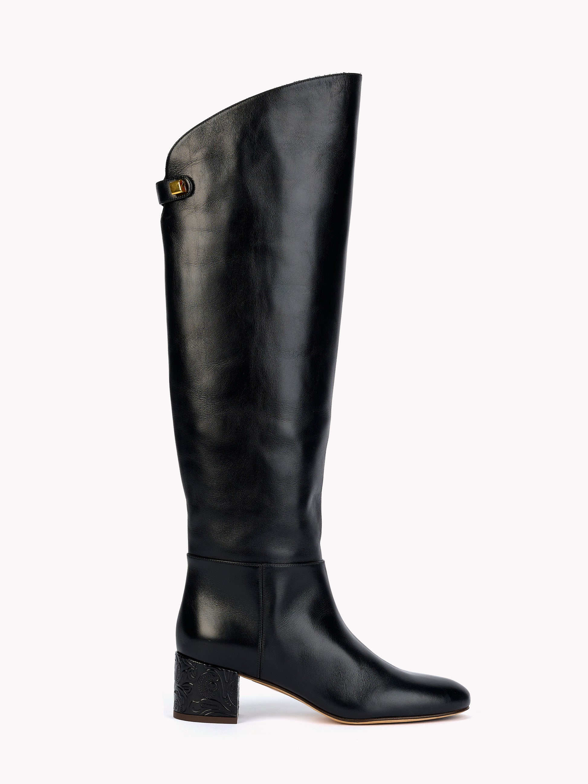Designer boots for women in black leather and mid heels by Adriana abascal Emanuele filiberto
