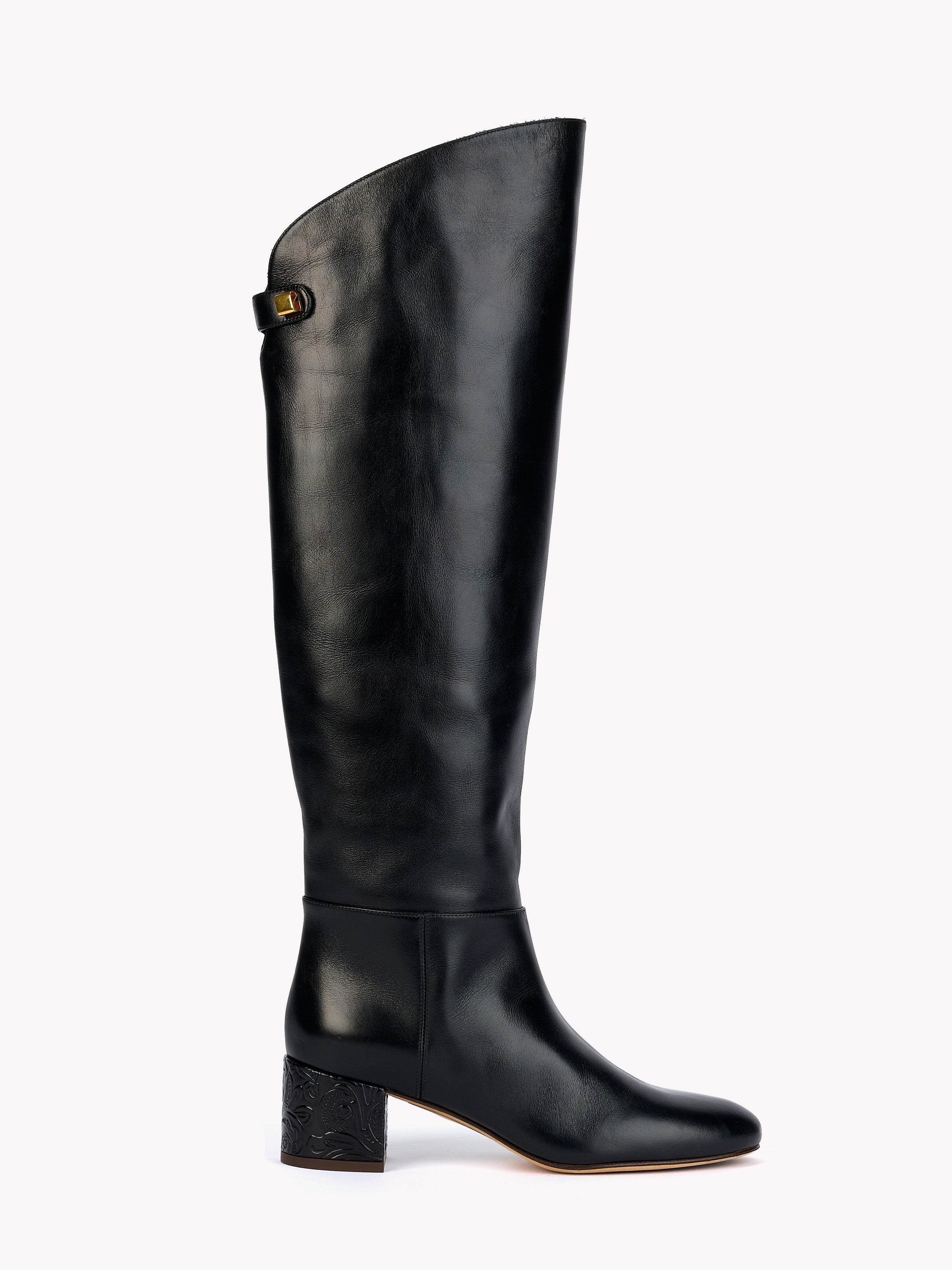 Designer boots for women in black leather and mid heels by Adriana abascal Emanuele filiberto
