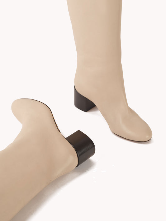 mid heel luxury boots in white leather maison skorpios by adriana abascal emanuele filiberto