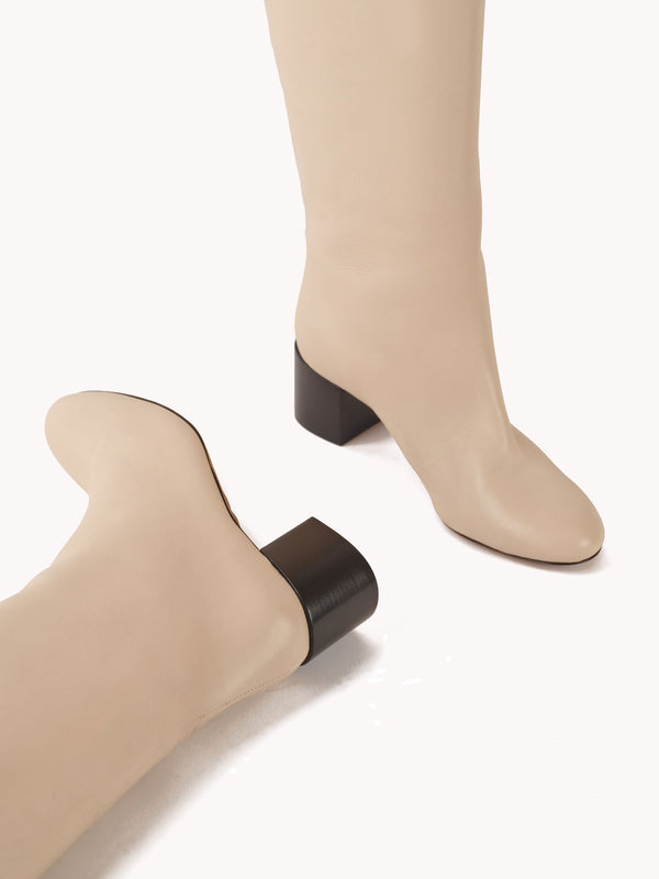 mid heel luxury boots in white leather maison skorpios by adriana abascal emanuele filiberto