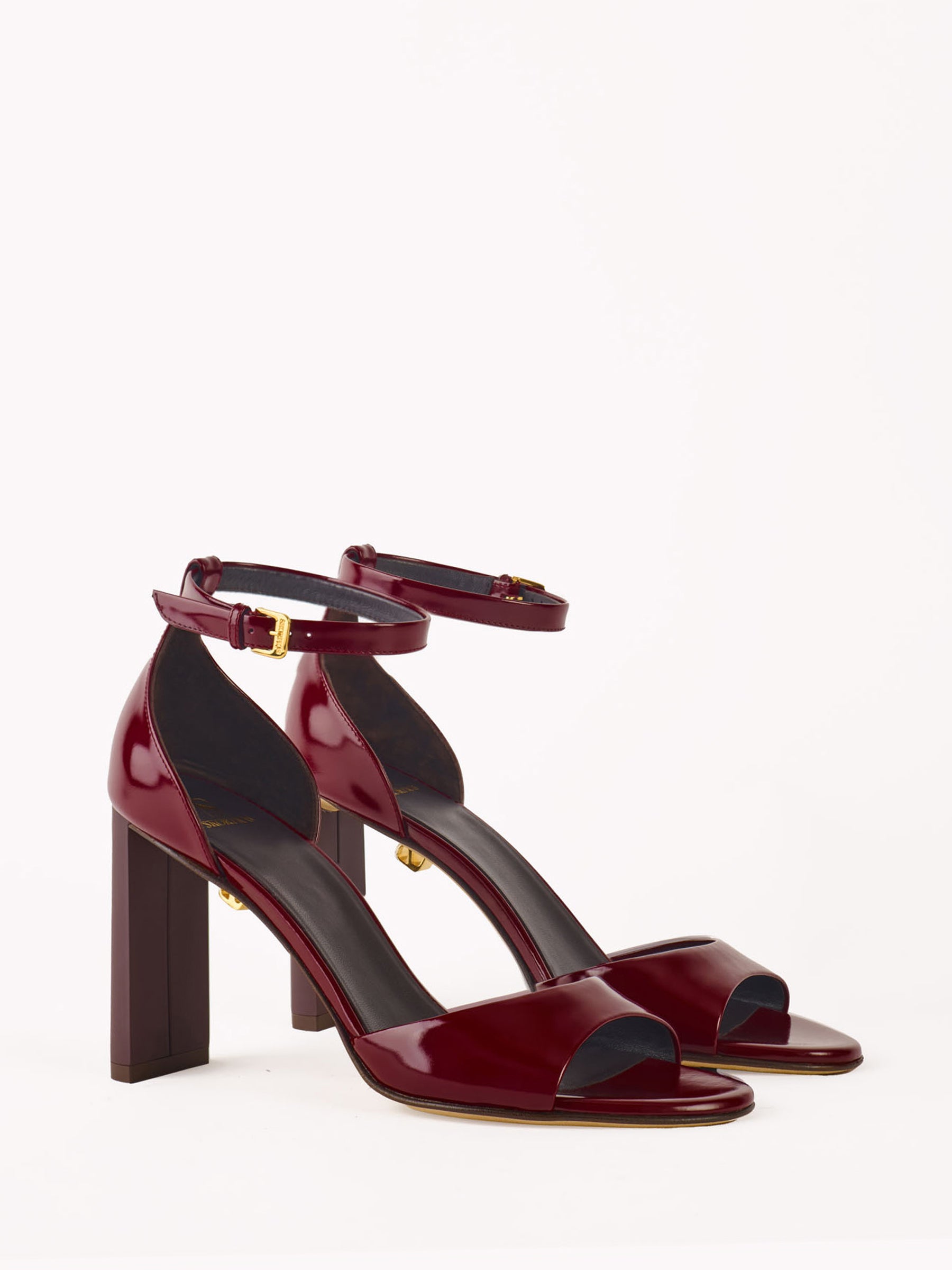 Burgundy luxurious sandals, by Adriana Abascal. Designer heels. Filiberto di Savoia, Clotilde Courau