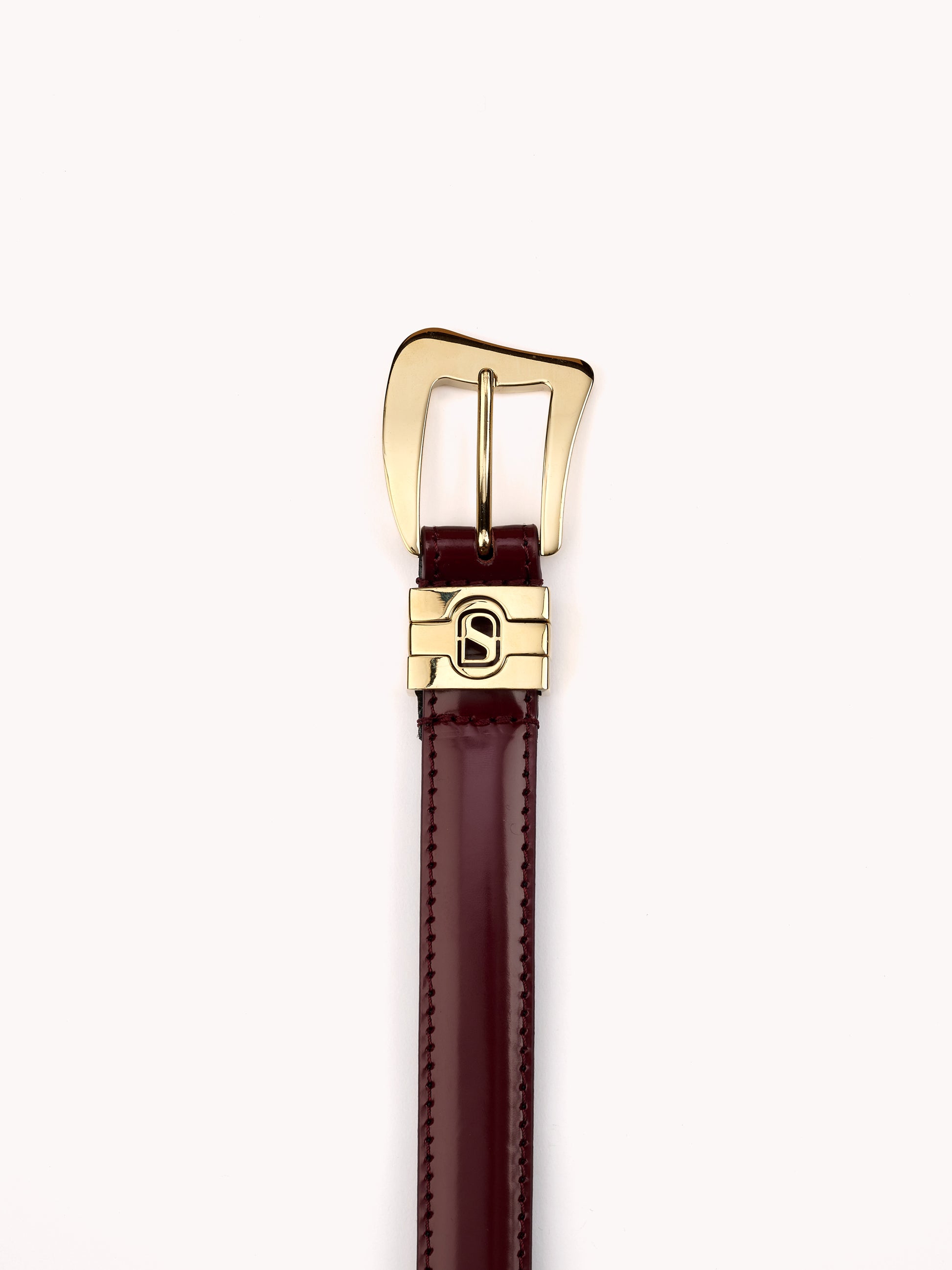 Luxury belt for women in glazed burgundy calf leather and gold brass buckle Maison Skorpios By Adriana Abascal