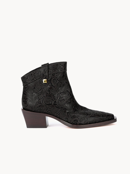 Casual western luxury boots in black floral leather by Adriana Abascal Filiberto de Saboya