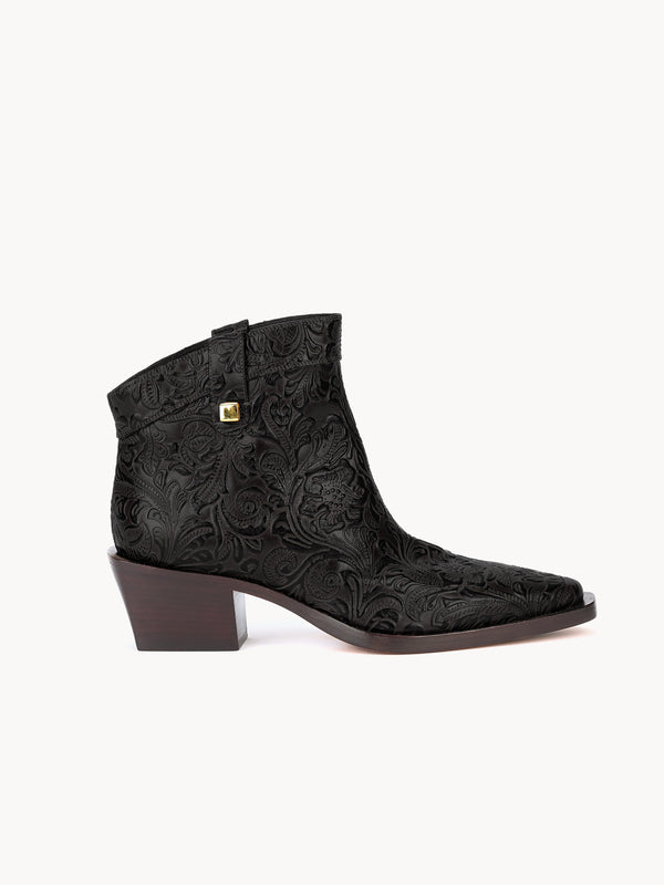 Casual western luxury boots in black floral leather by Adriana Abascal Filiberto de Saboya