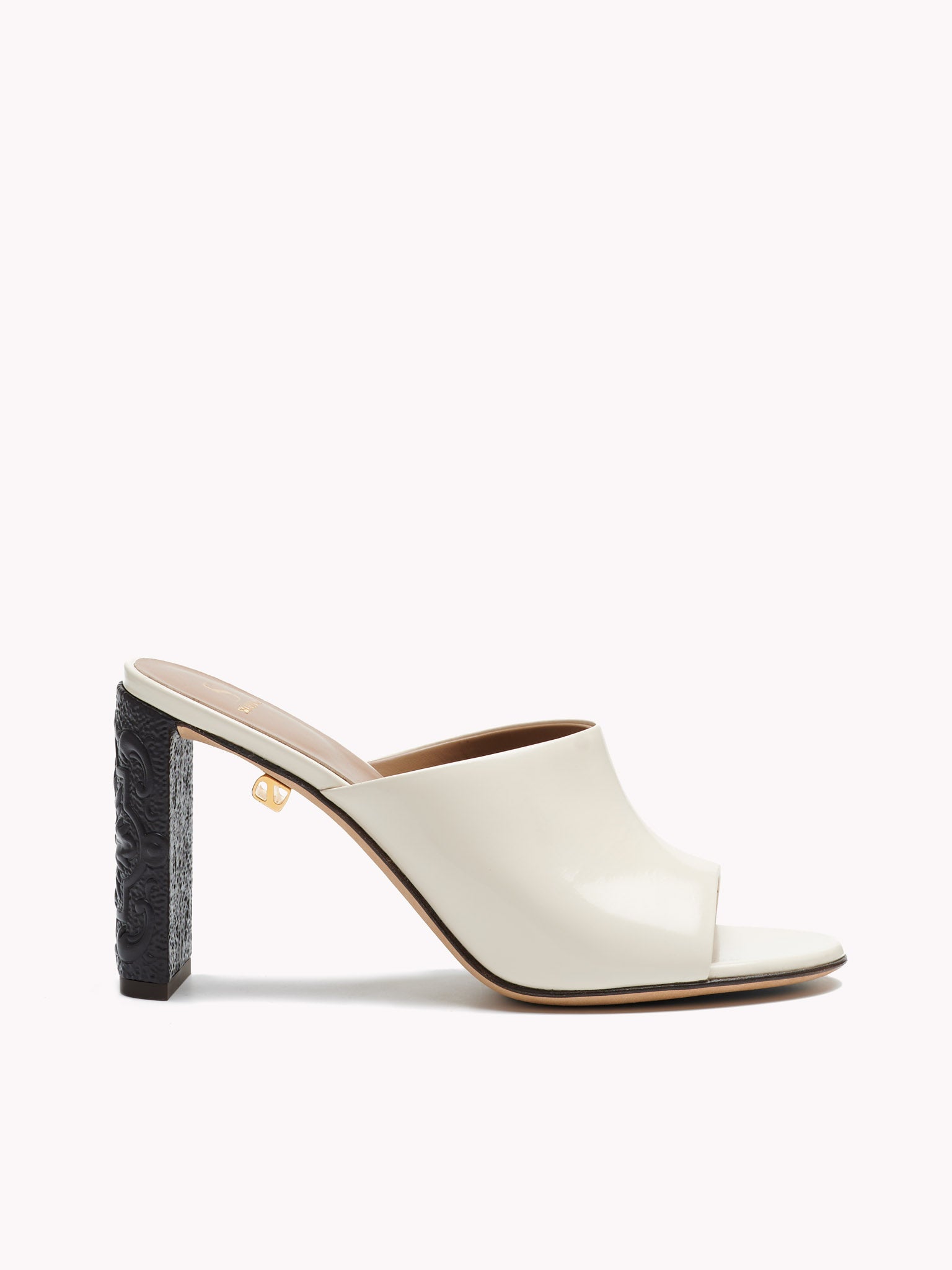 Patent beige leather mules with embossed high heels Maison Skorpios by Adriana Abascal