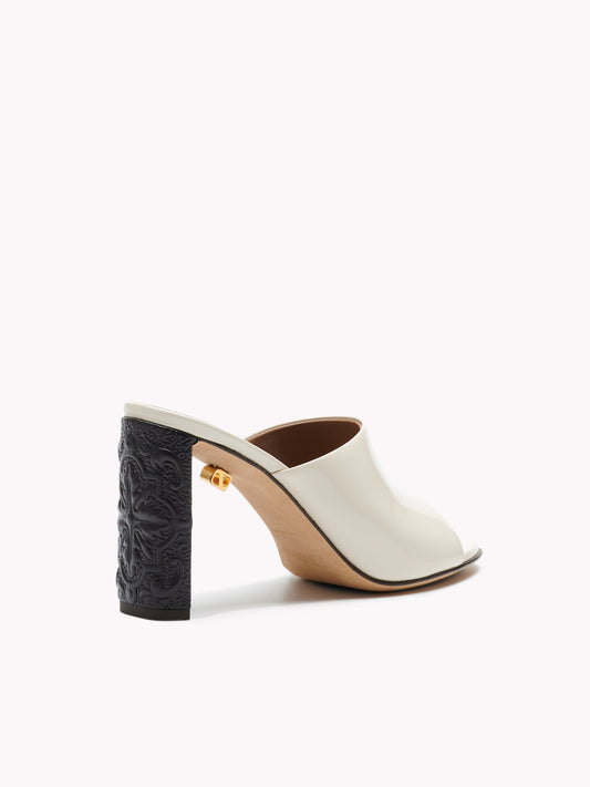 Patent beige leather mules with high heel Maison Skorpios by Adriana Abascal