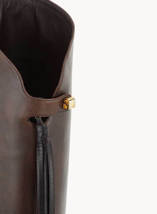scorpios' signature gold jewel in brown chocolate leather equestrian luxury boots