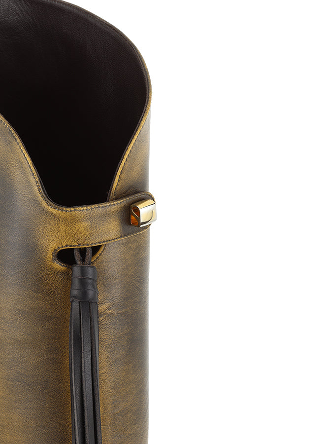 scorpios' signature gold jewel in golden brown leather equestrian luxury boots