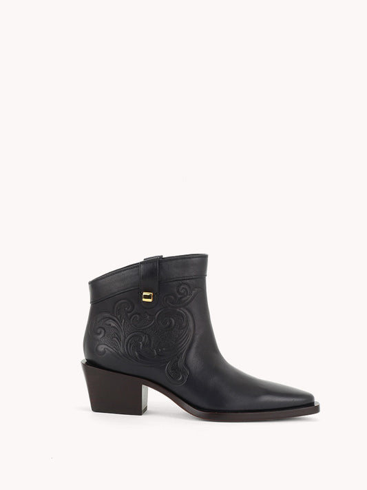 elegant santiag black leather embossed low boots maison skorpios by adriana abascal Filiberto de Saboya