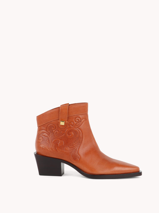 brown embossed leather western boots maison skorpios by adriana abascal Filiberto de Saboya