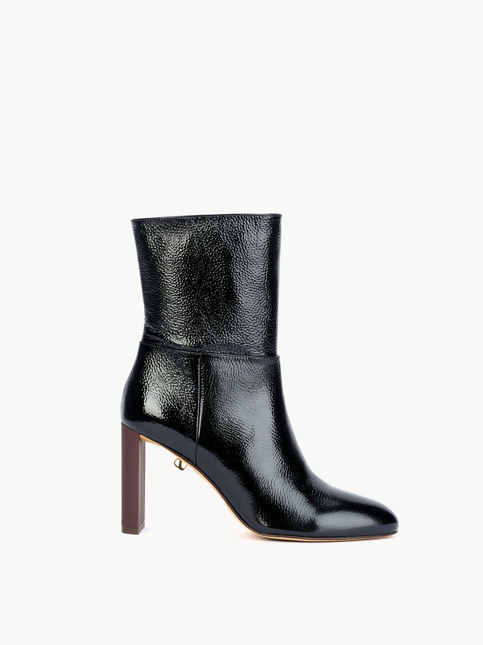 Ankle boots in black grained patent leather. High-heel, Luxurious shoes by Adriana Abascal. Emmanuel of savoy