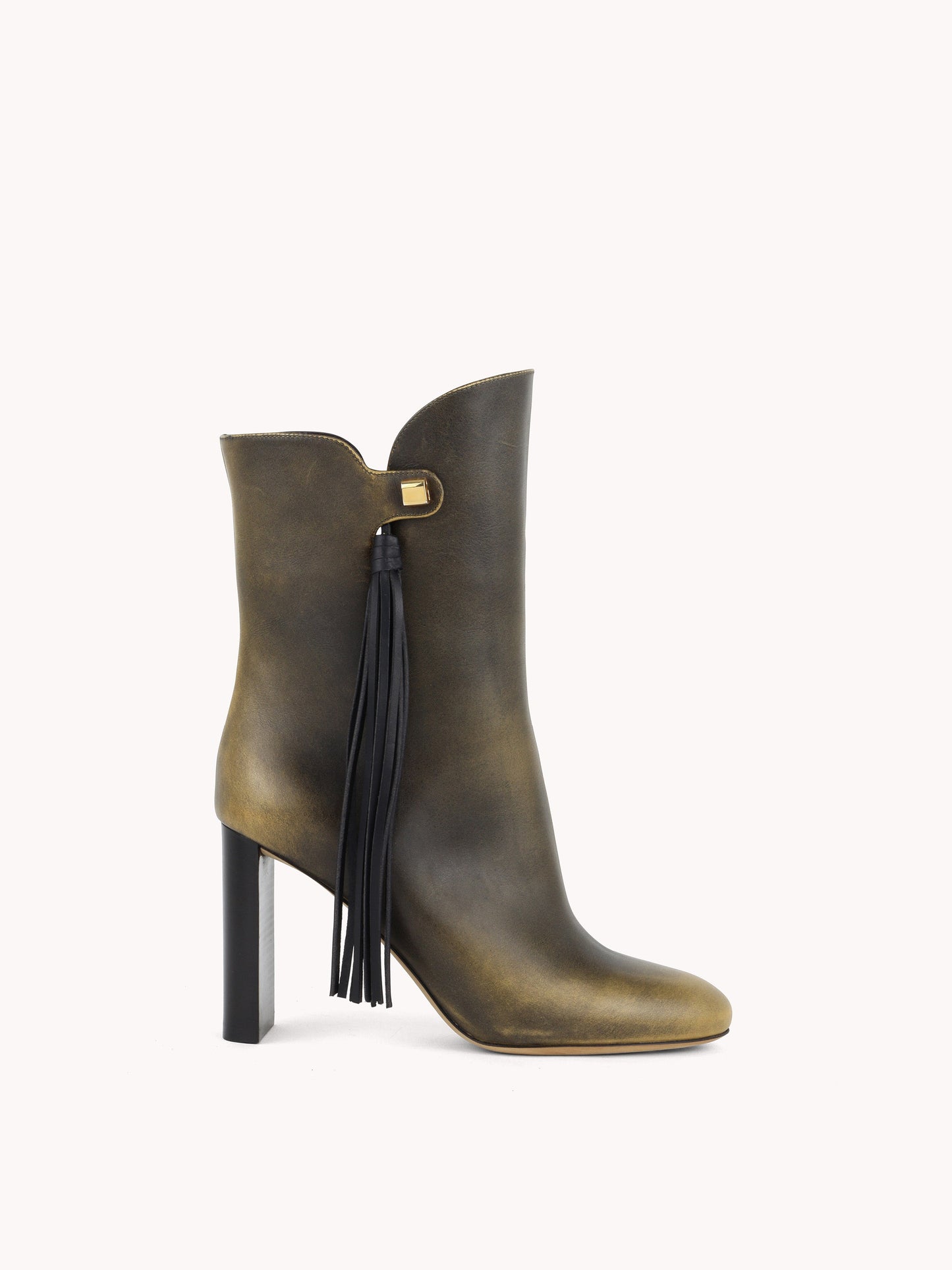 sophisticated golden brown leather ankle boots with an equestrian strap skorpios