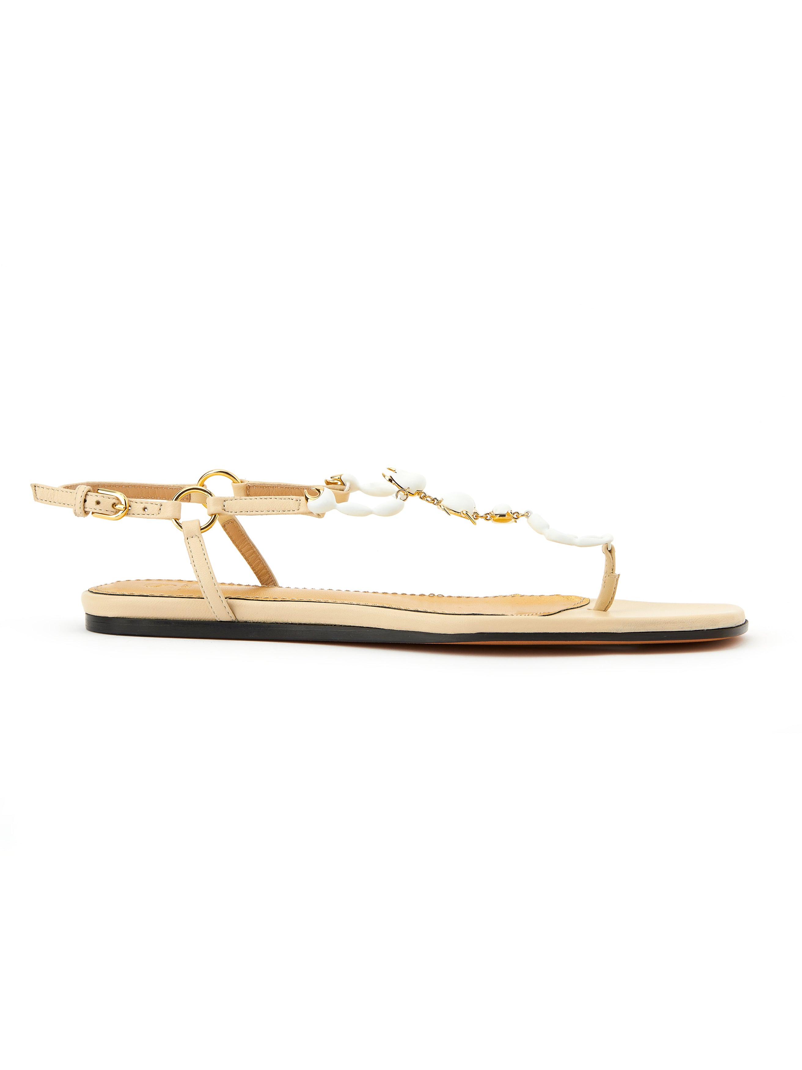 luxury summer sandals in beige and white leather with scorpio designer details maison skorpios by adriana abascal emanuele filiberto di Savoia 