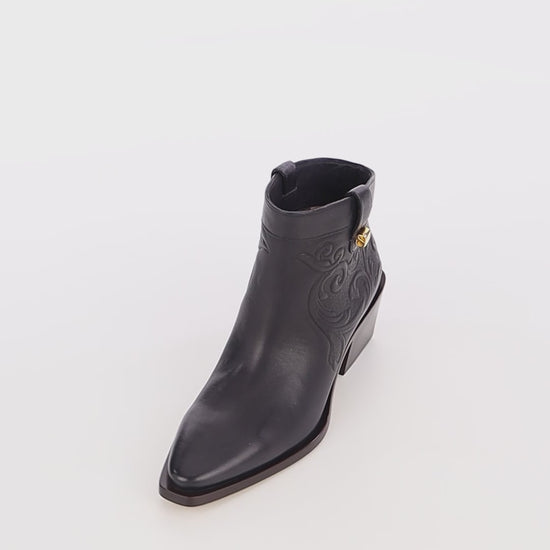 trendy modern low boots black embossed leather skorpios