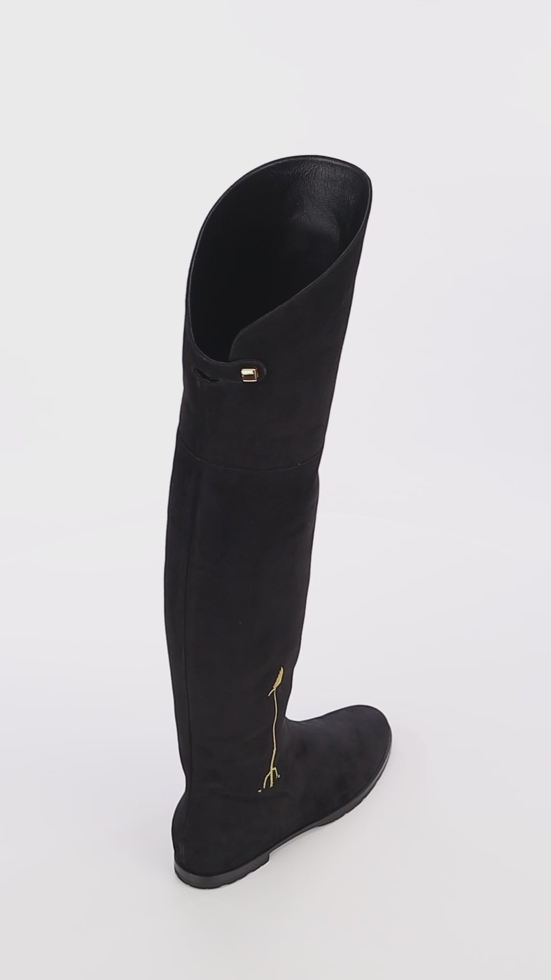 trendy black suede over the knee flat boots with embroidered gold arrow skorpios