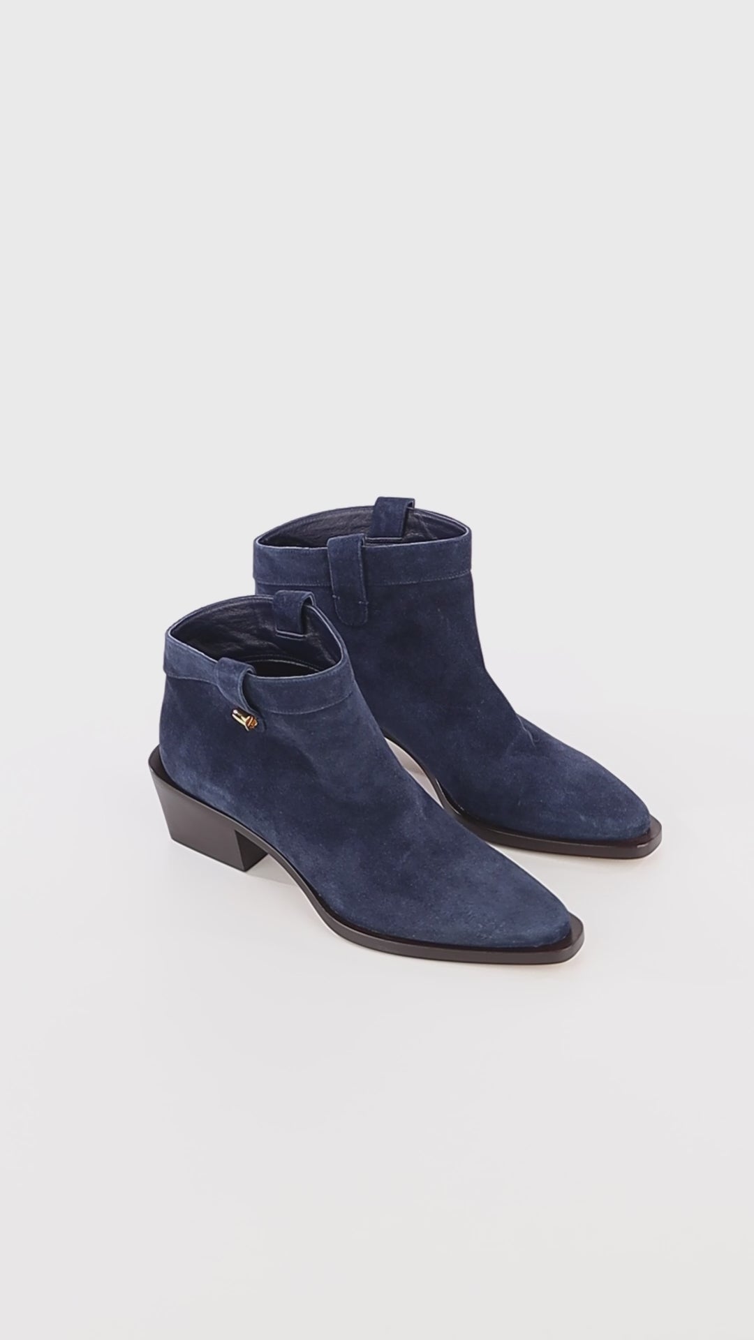 luxury blue west boots ankle and mid heel maison skorpios by adriana abascal Emanuele di Savoia 