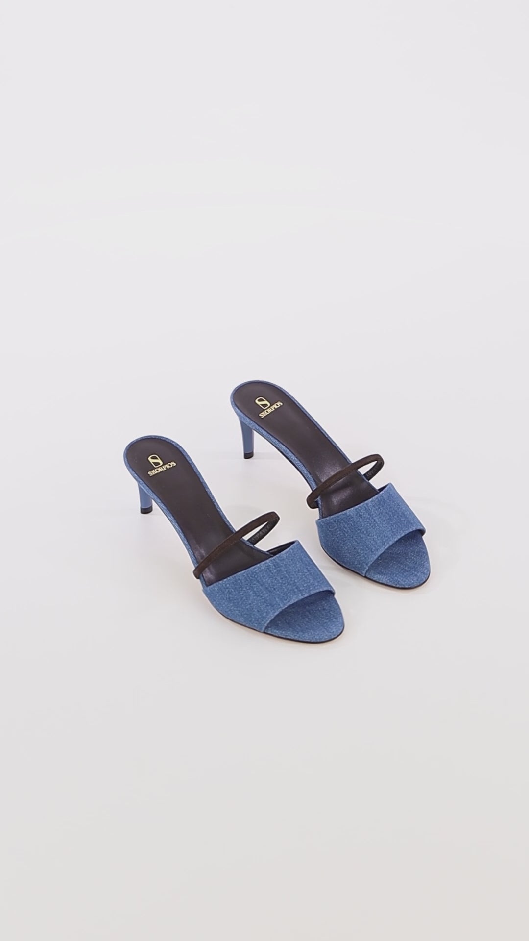 sophisticated blue denim mules mid height stiletto heels skorpios