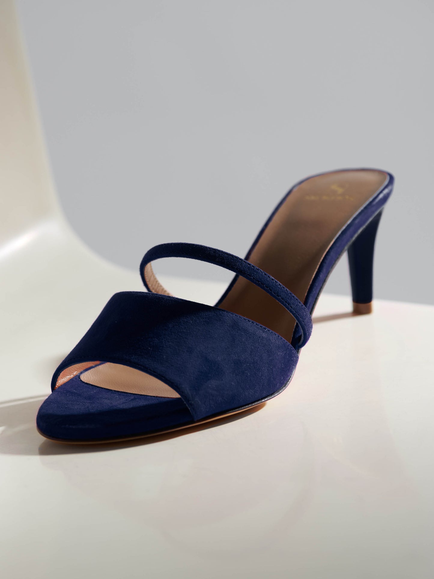 designer mules elegant cashmere suede navy mid-heel stiletto skorpios