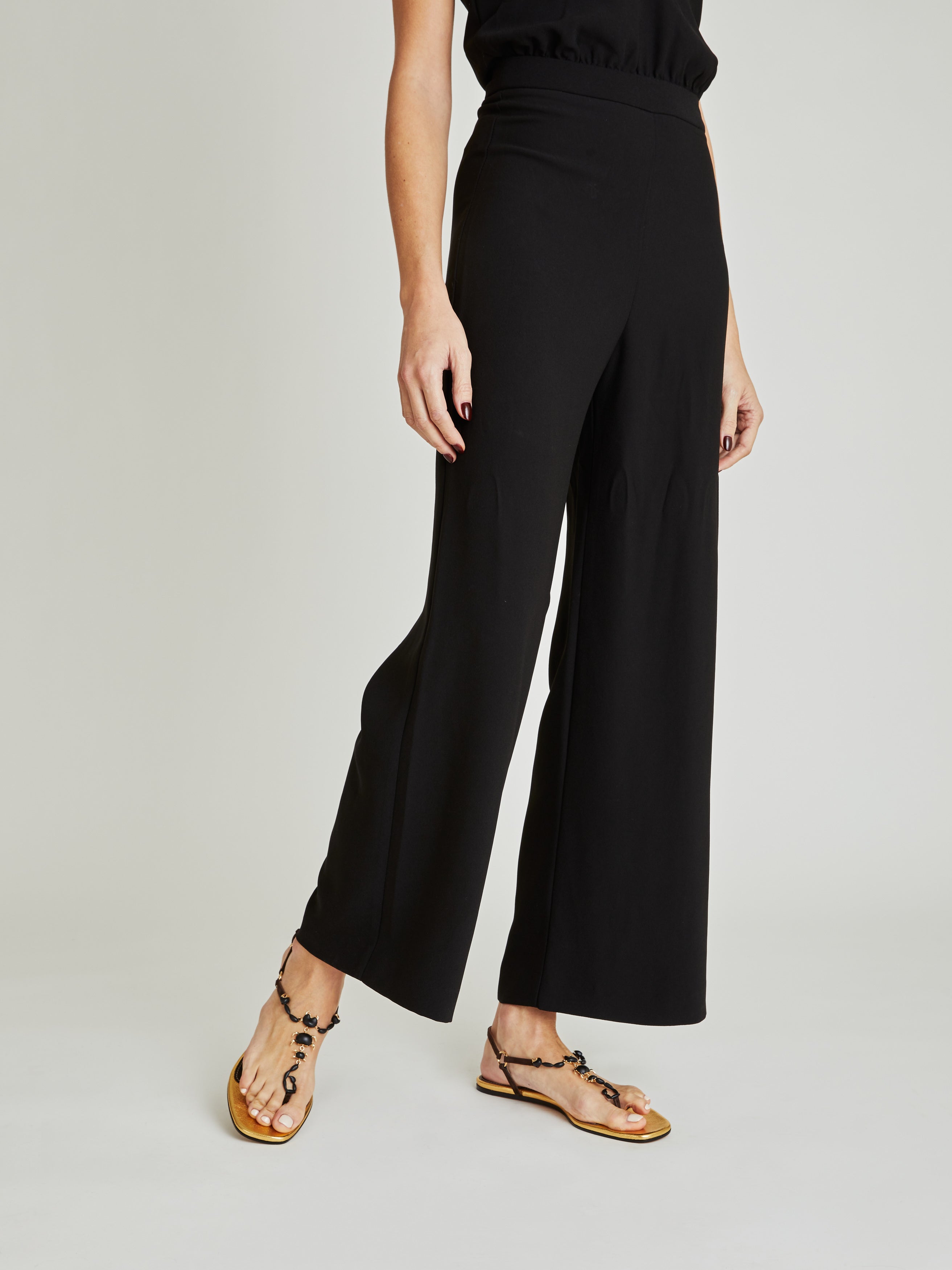 elegant black suede and gold leather flat sandals maison skorpios by adriana abascal emanuele filiberto di Savoia 